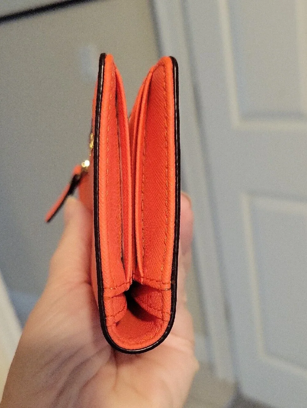 kate spade Bifold snap close orange wallet side zip pouch
